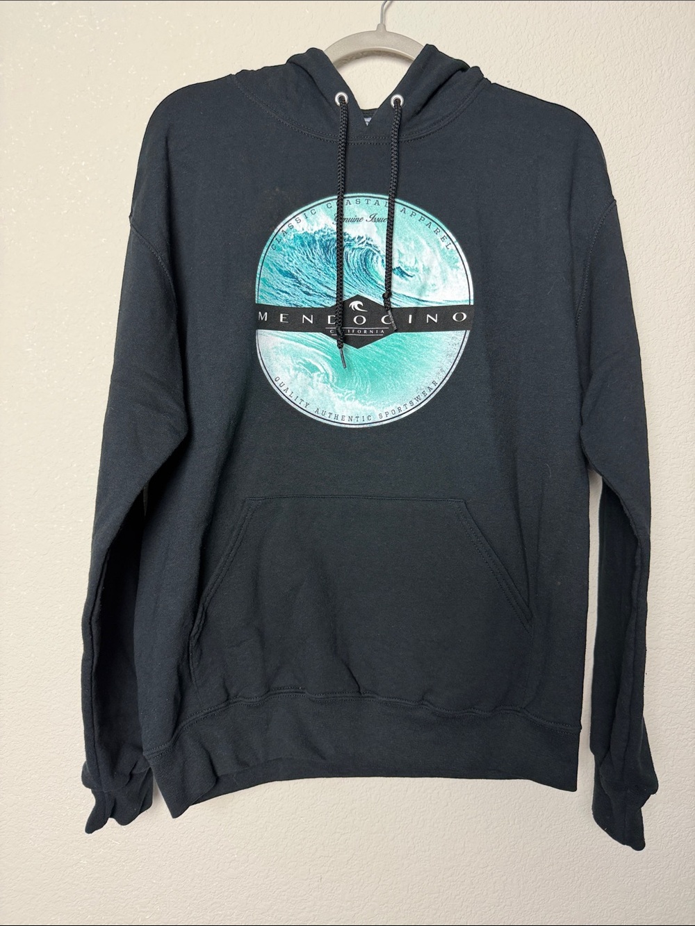 Men’s Jerzees Mendocino Graphic Print Black Hoodie with Turquoise Wave Logo